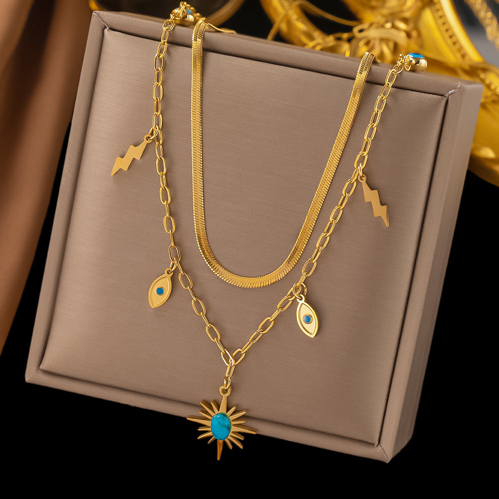 Collar con colgante de ojo azul de marca redonda de doble capa de acero al por mayor